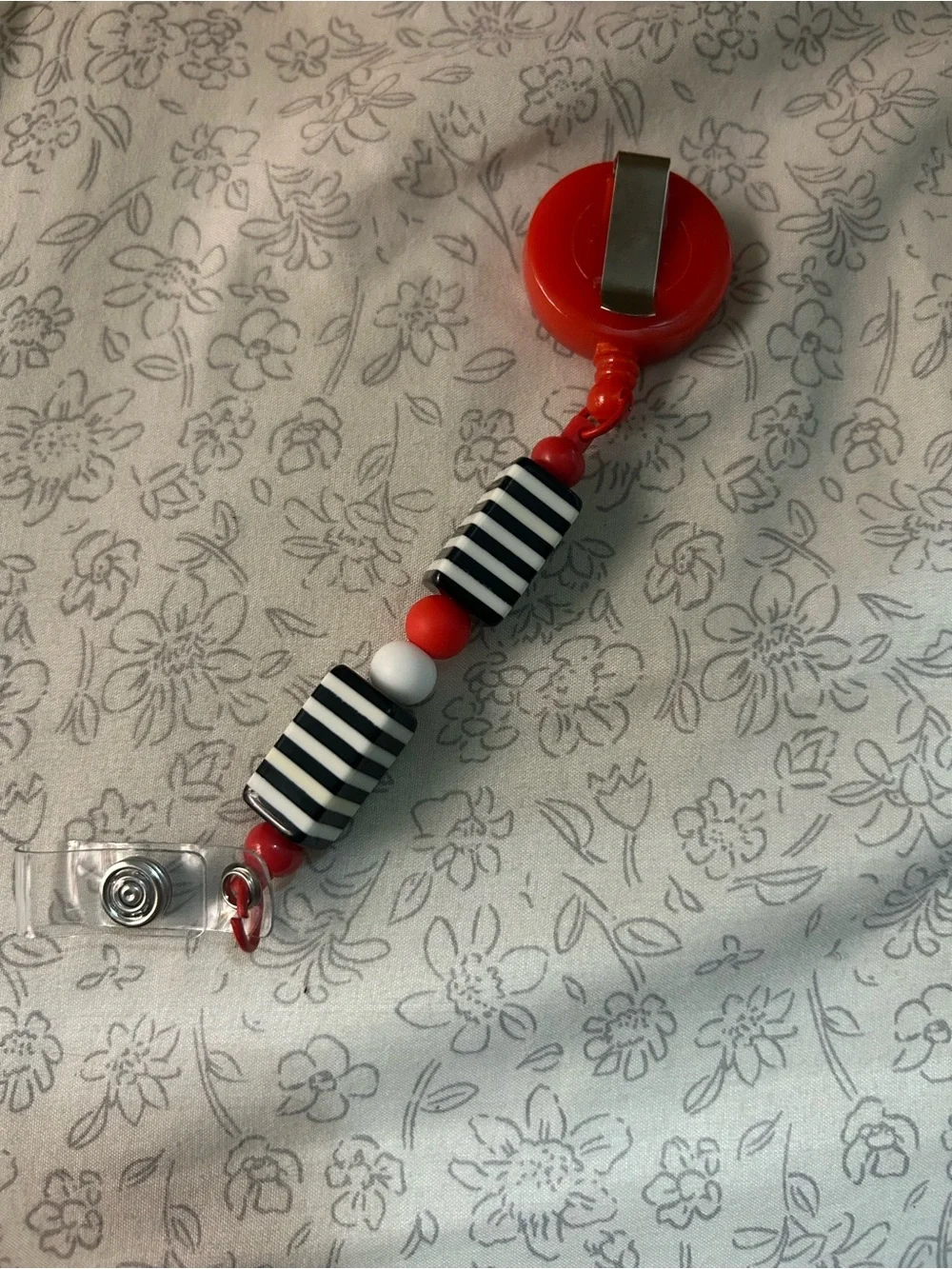 Red Beaded Badge Reel with Black & White Accents